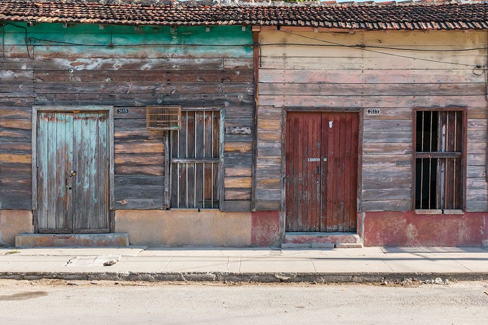 Cuba, Cienfuegos. Street scenes and old buildings and doors.